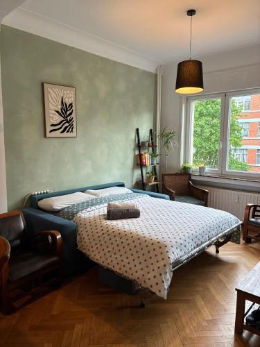 a bedroom with a bed in a room at Spacious Home in Brussels in Brussels