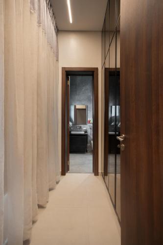 a hallway with a door leading to a bathroom at 108 Opebi Executive Apartments in Lagos