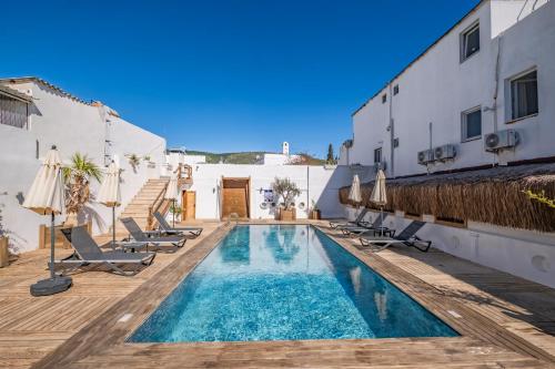 a swimming pool in the middle of a building at Costa Viva Bodrum in Bodrum City