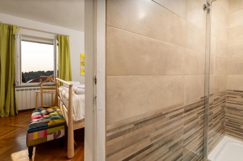 a bathroom with a shower with a glass door at House Erin Tara Sigrid, Hvar in Hvar