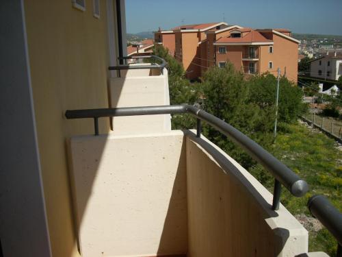 a set of stairs with a railing on a building at Hotel Margherita in San Giovanni Rotondo