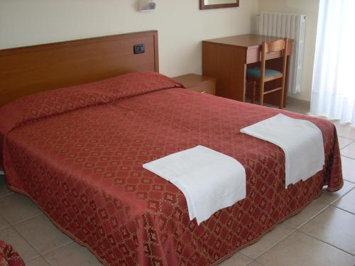 Postelja oz. postelje v sobi nastanitve Hotel Margherita