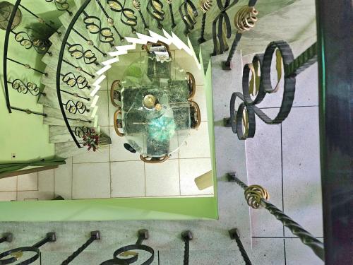 an overhead view of a clock on a wall at The Green Villa in Ludhiana