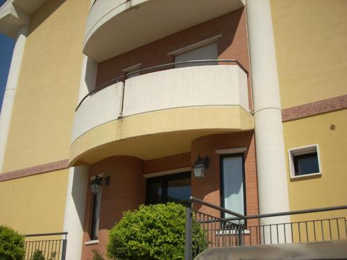 a building with a balcony on the side of it at Hotel Margherita in San Giovanni Rotondo