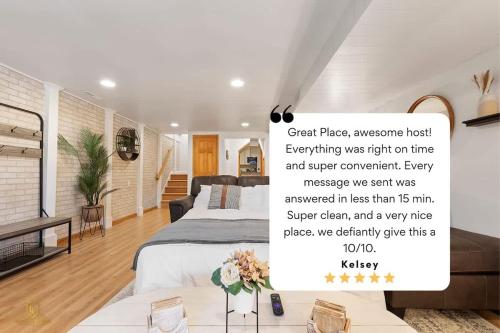 a room with a bed and a sign on the wall at Elegant Manhattan Duplex in Manhattan