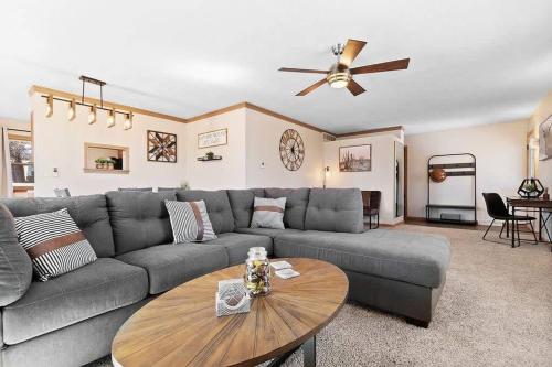 a living room with a couch and a table at Elegant Manhattan Duplex in Manhattan