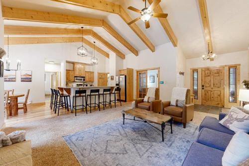 a living room with a couch and a table at Sunset Cabin in McCall