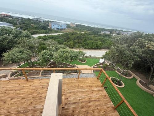 an overhead view of a park with a wooden walkway at Seenekal views in Cannon Rocks