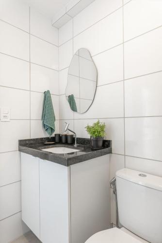 a bathroom with a sink and a toilet at Full Apartment with Pool and Gym - M1605 in Recife