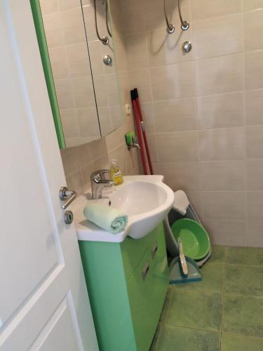 a bathroom with a sink and a shower at toni in Makarska