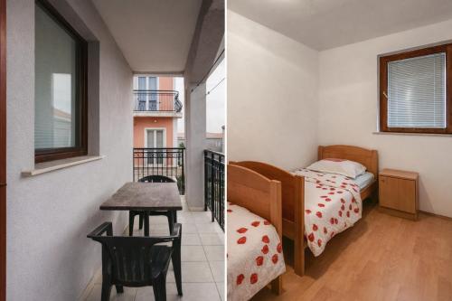 a room with a bed and a table and a bed and a balcony at MAAR Kovačić Apartmani in Zaton