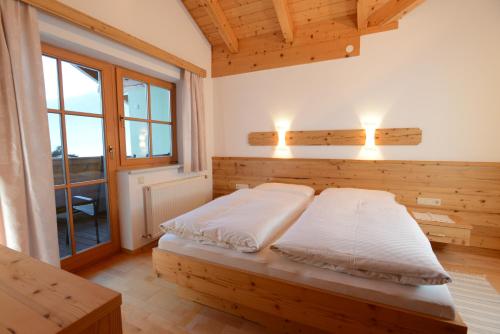 Postel nebo postele na pokoji v ubytování Landhaus Kainhof