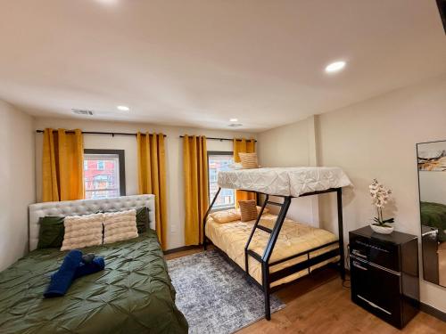 a bedroom with a bunk bed and a bunk bed at BP STAYS - Hotel-Style, No Host, Professionally Managed ID312 in Jersey City