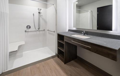a bathroom with a sink and a shower at My Place Hotel-Missoula, MT in Missoula