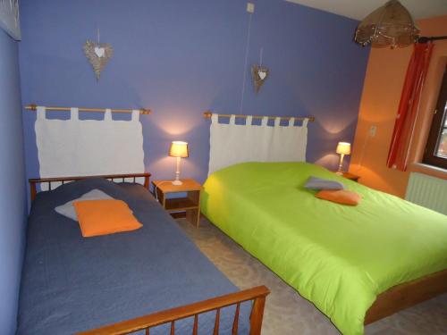 En eller flere senger på et rom på Villa Clara