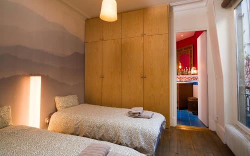 Grand Appartement Haussmannien au Cœur de Paris