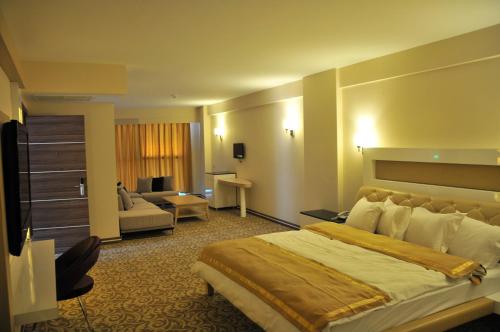 Lova arba lovos apgyvendinimo įstaigoje Ozpark Hotel