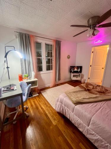 a bedroom with a bed and a ceiling fan at Bankston A in Marietta
