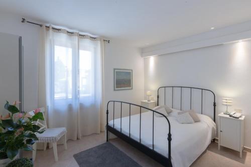 Cama o camas de una habitación en Albergo Al Castello