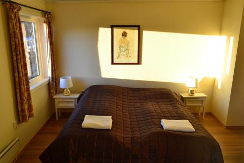 Posteľ alebo postele v izbe v ubytovaní VIKEDAL VERTSHUS hotel