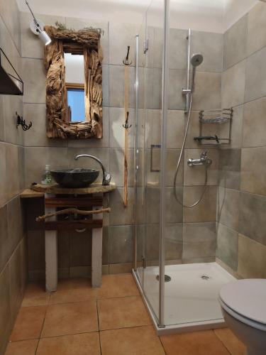 a bathroom with a shower and a sink at Appartement Melchior - Turm Krk in Sveti Vid-Miholjice
