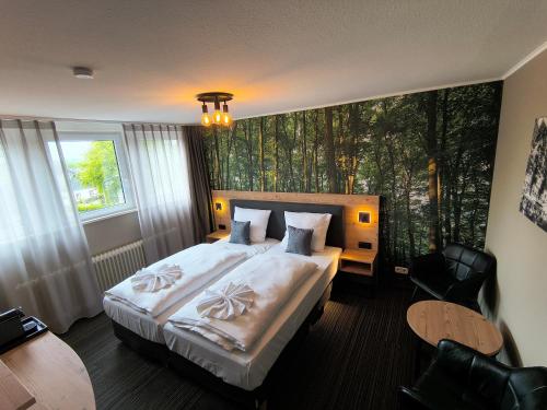 Krevet ili kreveti u jedinici u okviru objekta Hotel De Lange Man