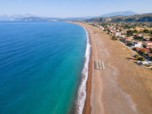 an aerial view of a beach and the ocean at Marilia GuestHouse - Seaside Retreat in Evia in Agia Anna
