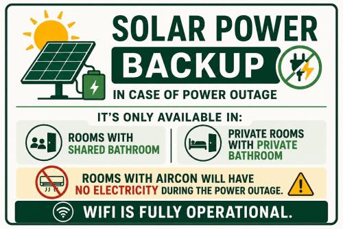 a sign that reads solar power backup in case of power outage at Tribal Xperience Guesthouse in San Vicente