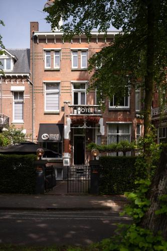 a brick building with a sign that reads oreo at Oranjestaete Boutique Hotel & Apartments in Nijmegen