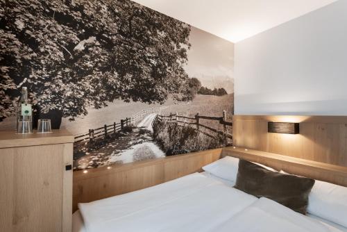 Llit o llits en una habitació de Hotel Grüner Baum