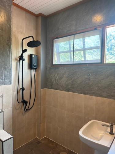 a bathroom with a shower and a sink at Thai Terrace Bungalow in Thong Nai Pan Yai