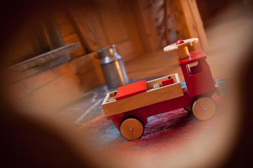 a toy car is sitting on a table at Le Chalet de Lara in Val dʼIlliez