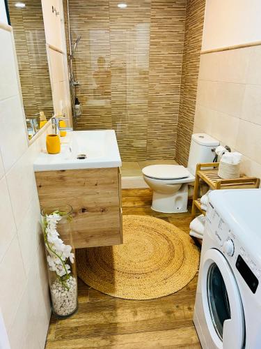 a bathroom with a sink and a toilet at Puerto de Pollença - Beach and Center,Happy Mar in Port de Pollensa