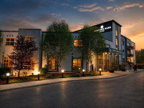a building on the side of a street at night at Newtown Park Hotel in Wexford