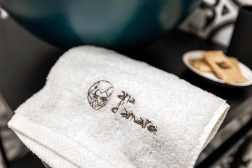 a white napkin with the word fail written on it at Aria d'amare in Mola di Bari
