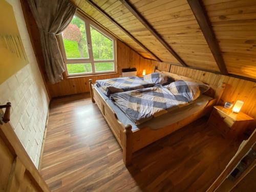 an overhead view of a bedroom in a cabin at Extertal-Ferienpark - Sonnenhügel in Extertal