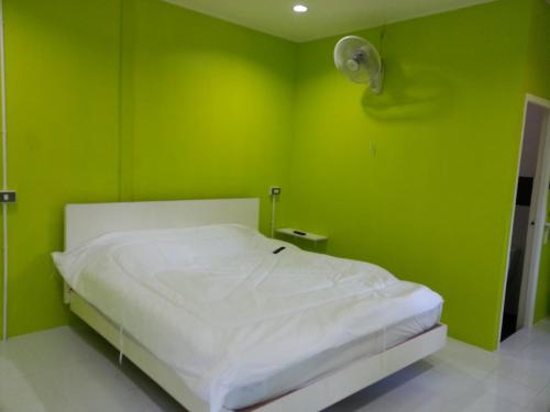 Кровать или кровати в номере Baan Phuean Koh Kood
