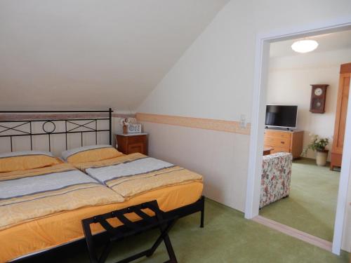 מיטה או מיטות בחדר ב-Pension Waldesblick