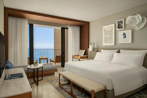 Giường trong phòng chung tại AMARA - Sea Your Only View