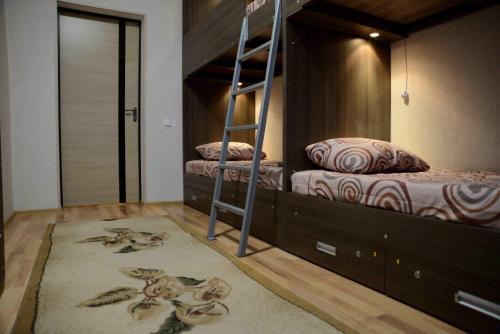 Ένα ή περισσότερα κρεβάτια σε δωμάτιο στο Rivne Hostel