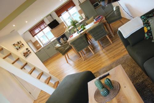 an aerial view of a living room and kitchen at Sternennächte auf einem echtem Bauernhof in Warpke