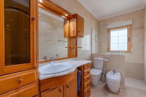 a bathroom with a sink and a toilet at Luxury Getaway in Girona in Riudellots de la Selva