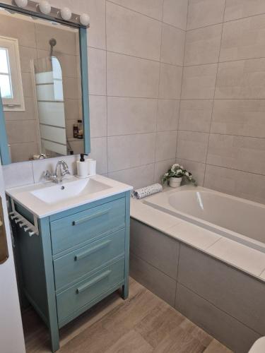 a bathroom with a sink and a bath tub at Cozy Studio Sea View in Chayofa in Chayofa