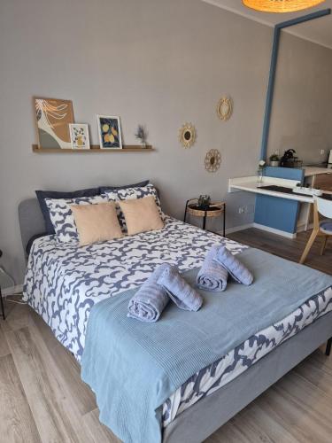 a bedroom with a bed with two pillows on it at Cozy Studio Sea View in Chayofa in Chayofa