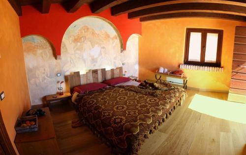 Postel nebo postele na pokoji v ubytování B&B Scacciapensieri - Vini d'Altura