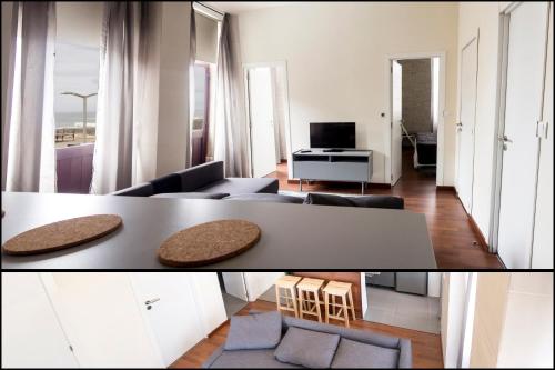 a living room with a couch and a table at Apartamento com 2 Quartos e Vista oceano in Ovar