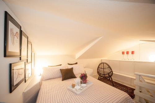 A bed or beds in a room at La Casa Di Luigi