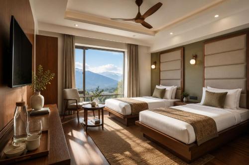 a hotel room with two beds and a large window at Hotel Grand Kings Premium in New Delhi