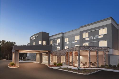 a rendering of the front of a hotel at Courtyard by Marriott Wayne Fairfield in Wayne