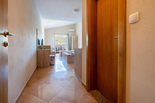 a hallway of a house with a door and a room at Villa Petra in Neum